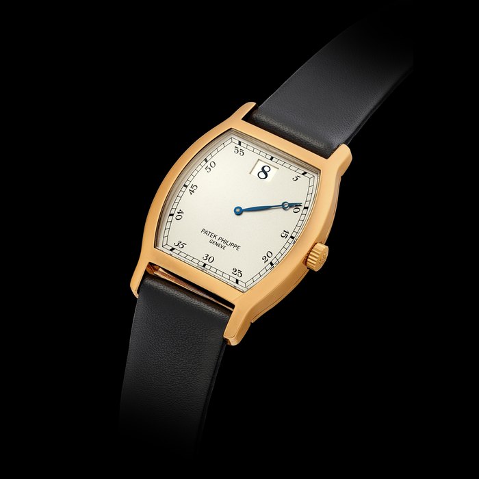 PATEK PHILIPPE. A RARE 18K PINK GOLD LIMITED EDITION TONNEAU SHAPED JUMP HOUR WRISTWATCH, MADE TO COMMEMORATE THE 150TH ANNIVERSARY OF PATEK PHILIPPE REF. 3969R, MOVEMENT NO. 752’771, CASE NO. 2’864’684, CIRCA 1989
