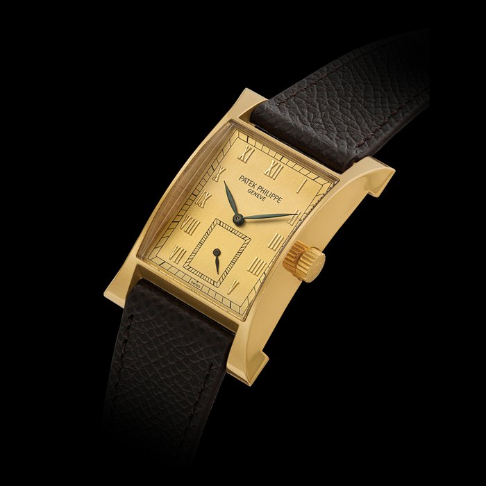 PATEK PHILIPPE. AN ATTRACTIVE 18K GOLD LIMITED EDITION RECTANGULAR WRISTWATCH, MADE TO COMMEMORATE THE INAUGURATION OF PATEK PHILIPPE’S NEW WATCHMAKING CENTRE IN 1997 PAGODA MODEL, REF.5500J, MOVEMENT NO. 1’859’037, CASE NO. 4’013’841