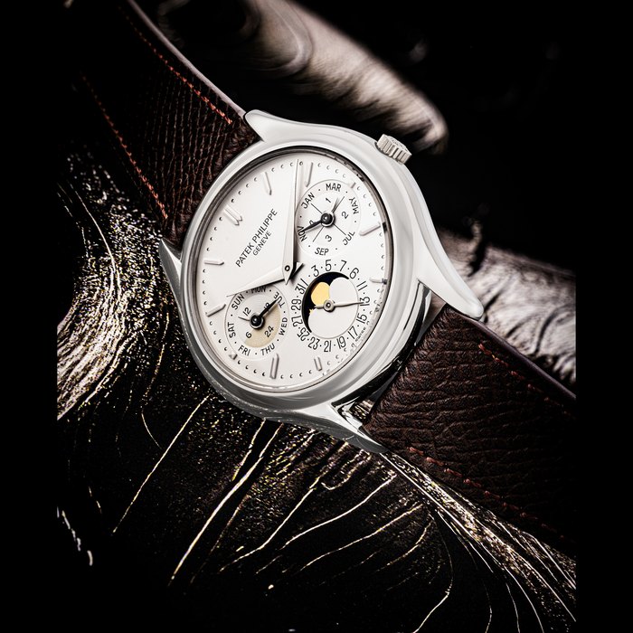PATEK PHILIPPE. A PLATINUM AUTOMATIC PERPETUAL CALENDAR WRISTWATCH WITH MOON PHASES, 24 HOUR AND LEAP YEAR INDICATION REF. 3940P, “SECOND SERIES”, MOVEMENT NO. 773’229, CASE NO. 2’910’231, CIRCA 1992