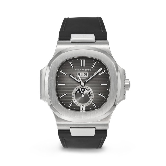 PATEK PHILIPPE. AN ATTRACTIVE STAINLESS STEEL AUTOMATIC ANNUAL CALENDAR WRISTWATCH WITH SWEEP CENTER SECONDS, MOON PHASES AND 24-HOUR INDICATION SIGNED PATEK PHILIPPE, NAUTILUS MODEL, REF. 5726A-001, MOVEMENT NO. 5'873'585, CASE NO. 6'039'168, CIRCA 2015