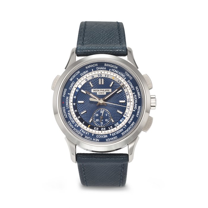 Patek Philippe PATEK PHILIPPE. AN ATTRACTIVE 18K WHITE GOLD AUTOMATIC FLYBACK CHRONOGRAPH WORLD TIME WRISTWATCH SIGNED PATEK PHILIPPE, REF. 5930G-010, MOVEMENT NO. 5'920'532, CASE NO. 6'134'470, CIRCA 2016, Price & Market Data
