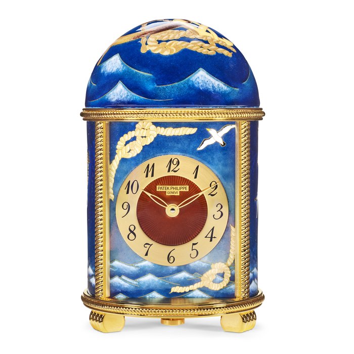 PATEK PHILIPPE. AN EXCEPTIONAL AND UNIQUE GILT BRASS DOME TABLE CLOCK WITH ‘OCEAN-GOING VESSELS’ CLOISONNÉ ENAMEL DECORATION SIGNED PATEK PHILIPPE, REF. 10001M-001, MOVEMENT NO. 7'209'790, CASE NO. 1’805’120, CIRCA 2022