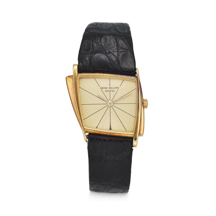 PATEK PHILIPPE. AN EXTREMELY RARE, UNUSUAL AND COVETED 18K GOLD ASYMMETRICAL WRISTWATCH, DESIGNED BY GILBERT ALBERT SIGNED PATEK PHILIPPE, 'RHOMBOID 2' BY GILBERT ALBERT, REF. 3422, MOVEMENT NO. 1'371'563, CASE NO. 2'610'963, MANUFACTURED IN 1959