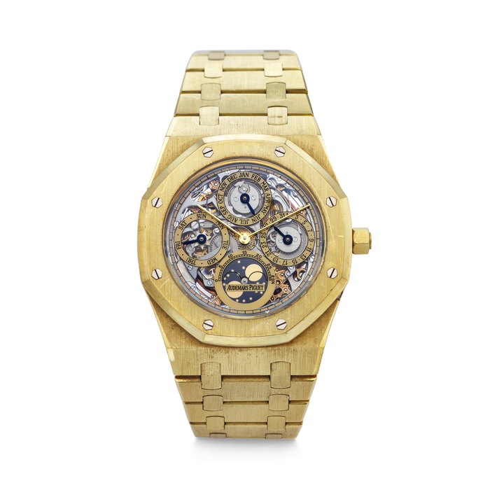 AUDEMARS PIGUET. A VERY RARE AND IMPRESSIVE 18K GOLD AUTOMATIC SKELETONIZED PERPETUAL CALENDAR WRISTWATCH WITH MOON PHASES AND BRACELET SIGNED AUDEMARS PIGUET, ROYAL OAK QUANTIEME PERPETUAL MODEL, REF. 25636BA, CASE NO. C32020, NO. 15, CIRCA 1980s