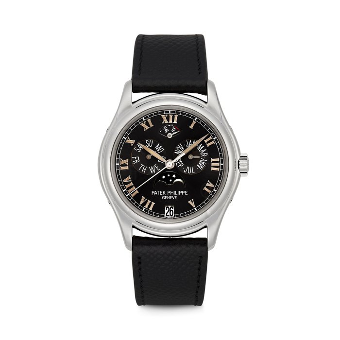 PATEK PHLIPPE. A VERY RARE PLATINUM AUTOMATIC ANNUAL CALENDAR WRISTWATCH WITH SWEEP CENTRE SECONDS, MOON PHASES AND POWER RESERVE REF. 5056P-001, MOVEMENT NO. 3’143’677, CASE NO. 4’084’843, CIRCA 1999