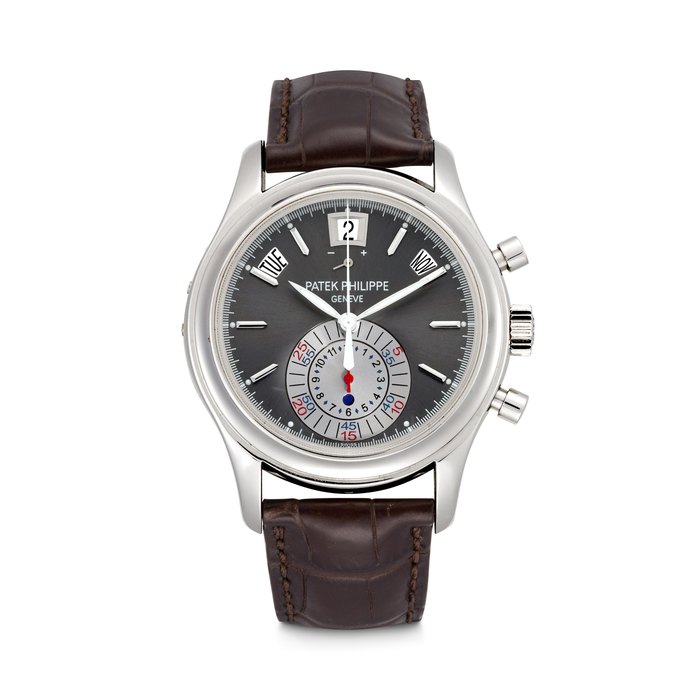 PATEK PHILIPPE. A PLATINUM AUTOMATIC ANNUAL CALENDAR FLYBACK CHRONOGRAPH WRISTWATCH WITH POWER RESERVE AND DAY/NIGHT INDICATION REF. 5960P-001, MOVEMENT NO. 3’504’482, CASE NO. 4’470’942, CIRCA 2009