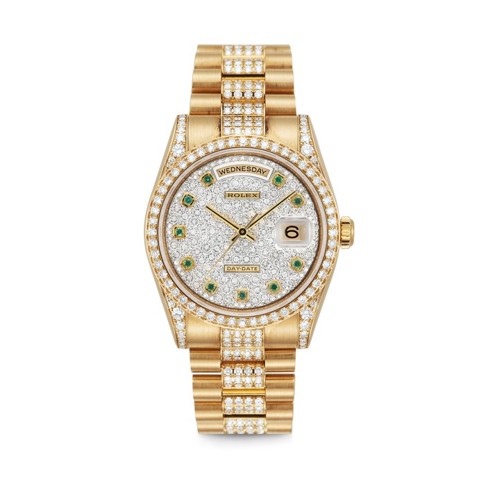 ROLEX. AN 18K GOLD, DIAMOND AND EMERALD-SET AUTOMATIC WRISTWATCH, WITH SWEEP CENTRE SECONDS, DAY, DATE AND BRACELET DAY-DATE MODEL, REF. 118388, CASE NO. K589998, CIRCA 2005