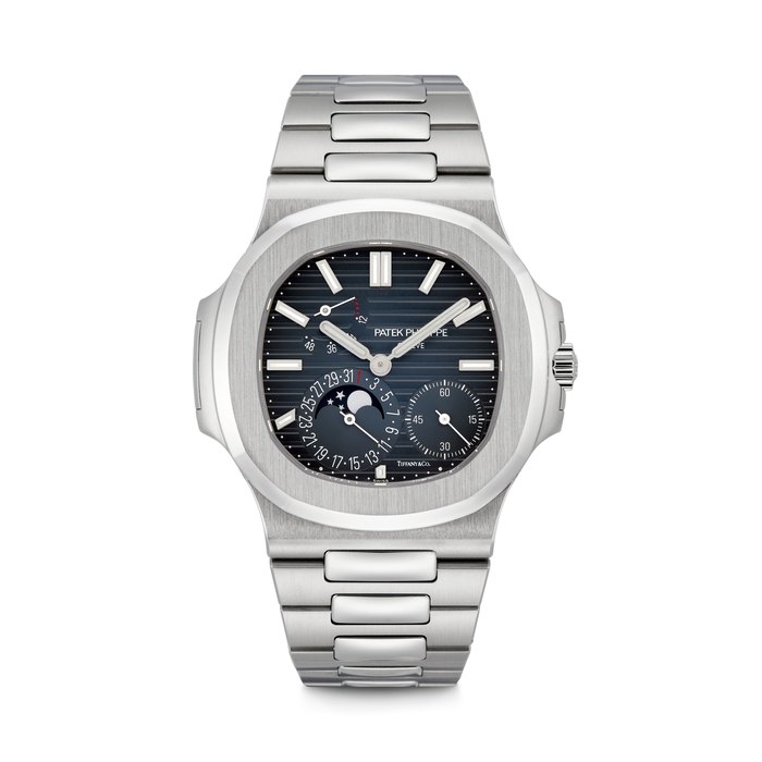 PATEK PHILIPPE. AN EXTREMELY RARE STAINLESS STEEL AUTOMATIC WRISTWATCH WITH MOON PHASES, DATE, POWER RESERVE AND BRACELET, RETAILED BY TIFFANY & CO. NAUTILUS MODEL, REF. 5712/1A-001, MOVEMENT NO. 7’516’839, CASE NO. 6’563’573, CIRCA 2022