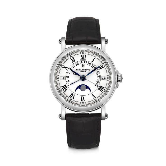 PATEK PHILIPPE. AN 18K WHITE GOLD AUTOMATIC PERPETUAL CALENDAR WRISTWATCH WITH SWEEP CENTRE SECONDS, RETROGRADE DATE, MOON PHASES AND LEAP YEAR INDICATION REF. 5059G, MOVEMENT NO. 1’957’476, CASE NO. 4’057’876, CIRCA 1999