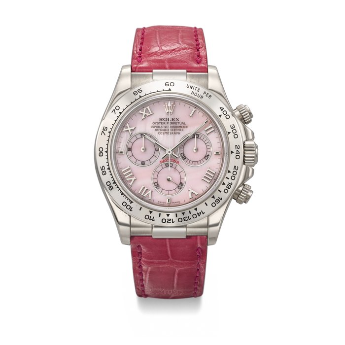 ROLEX. A RARE AND VIBRANT 18K WHITE GOLD AUTOMATIC CHRONOGRAPH WRISTWATCH WITH PINK MOTHER-OF-PEARL DIAL SIGNED ROLEX, DAYTONA 'BEACH' MODEL, REF. 116519, CASE NO. Y606641, CIRCA 2002