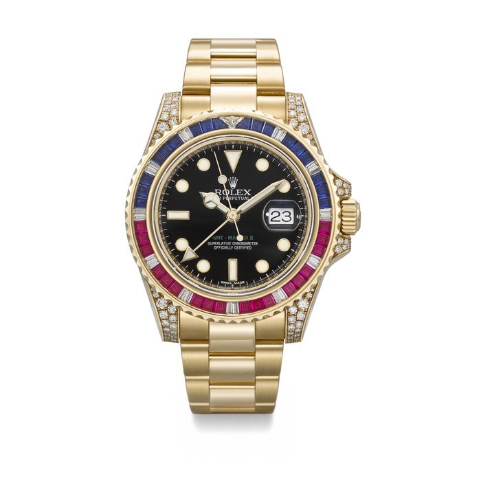 Rolex ROLEX. A RARE AND DAZZLING 18K GOLD, DIAMOND, RUBY AND SAPPHIRE-SET AUTOMATIC DUAL TIME WRISTWATCH WITH SWEEP CENTRE SECONDS, DATE AND BRACELET SIGNED ROLEX, GMT MASTER II 'SARU' MODEL, REF. 116758SARU, CASE NO. 1T28D041, CIRCA 2015 · 116758SARU
