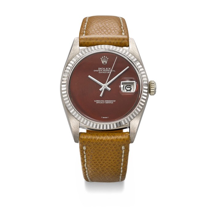 ROLEX. AN EXTREMELY RARE AND HIGHLY ATTRACTIVE 18K WHITE GOLD AUTOMATIC WRISTWATCH WITH SWEEP CENTRE SECONDS, DATE AND RED JASPER DIAL SIGNED ROLEX, DATEJUST MODEL, REF. 1601, CASE NO. 3'689'163, CIRCA 1974