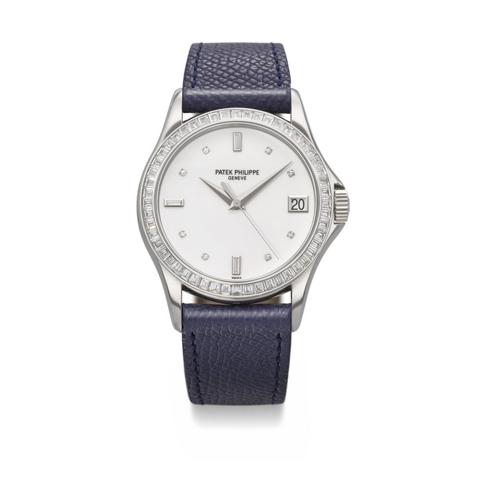 PATEK PHILIPPE. AN EXCEEDINGLY RARE AND ELEGANT PLATINUM AND DIAMOND-SET AUTOMATIC WRISTWATCH WITH SWEEP CENTRE SECONDS AND DATE SIGNED PATEK PHILIPPE, CALATRAVA MODEL, REF. 5118P-010, MOVEMENT NO. 3'980'670, CASE NO. 4'488'096, CIRCA 2009