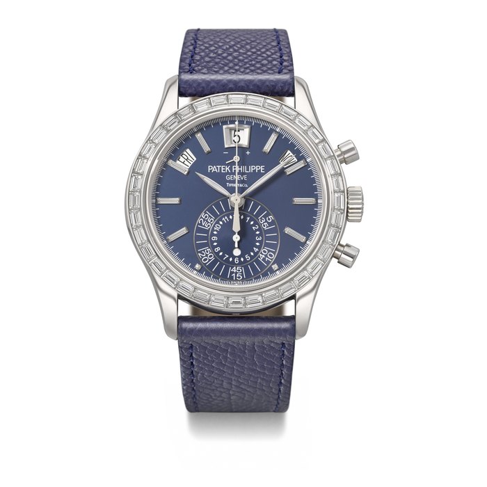 PATEK PHILIPPE. AN EXTREMELY RARE AND DAZZLING PLATINUM AND DIAMOND-SET AUTOMATIC ANNUAL CALENDAR FLYBACK CHRONOGRAPH WRISTWATCH WITH POWER RESERVE AND DAY/NIGHT INDICATION SIGNED PATEK PHILIPPE, RETAILED BY TIFFANY & CO., REF. 5961P-001, MOVEMENT NO. 7'019'748, CASE NO. 6'134'841, CIRCA 2017