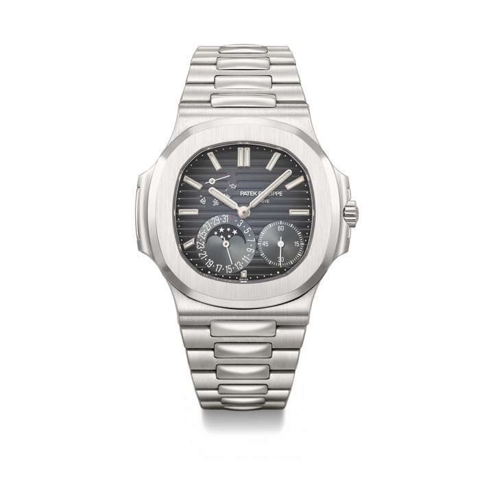 PATEK PHILIPPE. AN ATTRACTIVE AND COVETED STAINLESS STEEL AUTOMATIC WRISTWATCH WITH DATE, MOON PHASES, POWER RESERVE AND BRACELET SIGNED PATEK PHILIPPE, NAUTILUS MODEL, REF. 5712/1A-001, MOVEMENT NO. 7'348'923, CASE NO. 6'361'979, CIRCA 2020