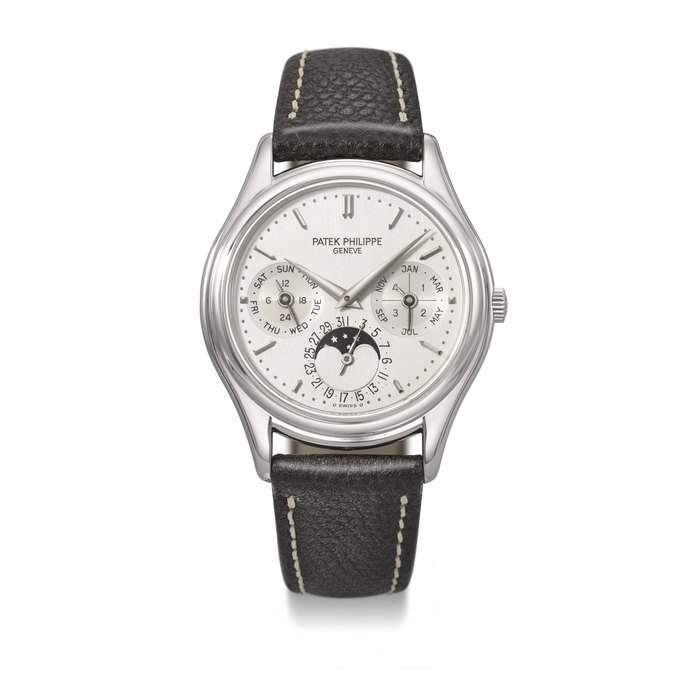 PATEK PHILIPPE. A VERY RARE AND ELEGANT PLATINUM AUTOMATIC PERPETUAL CALENDAR WRISTWATCH WITH MOON PHASES, 24-HOUR, AND LEAP YEAR INDICATION SIGNED PATEK PHILIPPE, REF. 3940P-001, MOVEMENT NO. 3'124'399, CASE NO. 4'058'967, CIRCA 1999