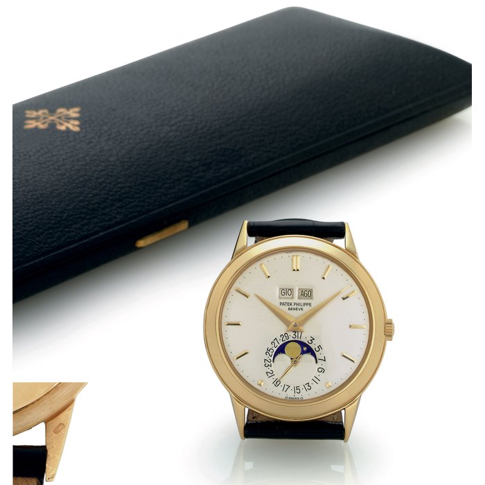 PATEK PHILIPPE. A FINE AND RARE 18K GOLD AUTOMATIC PERPETUAL CALENDAR WRISTWATCH WITH MOON PHASES SIGNED PATEK PHILIPPE, GENEVE, MOVEMENT N0. 1119362, CASE NO. 331518, REF. 3448, MANUFACTURED IN 1974