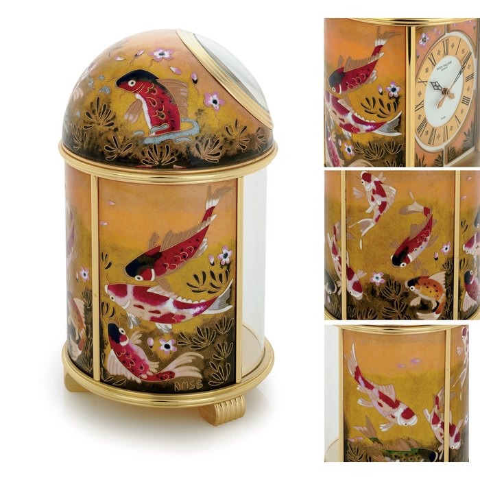 PATEK PHILIPPE. A FINE AND UNIQUE GILT BRASS SOLAR POWERED DESK CLOCK WITH CLOISONNÉ ENAMEL CHINESE CARP SIGNED PATEK PHILIPPE, GENEVE, DOME, CHINESE CARP , MOVEMENT NO. 1804693, REF. 1428, MANUFACTURED IN 1995