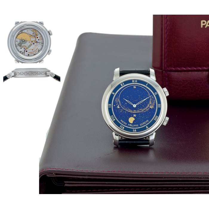 PATEK PHILIPPE. A FINE AND EXTREMELY RARE 18K WHITE GOLD AUTOMATIC ASTRONOMICAL WRISTWATCH WITH SKY CHART, PHASES AND ORBIT OF THE MOON AND TIME OF MERIDIAN PASSAGE OF SIRIUS AND OF THE MOON SIGNED PATEK PHILIPPE, GENEVE, CELESTIAL MODEL, MOVEMENT NO. 3328092, CASE NO. 4214494, REF. 5102G-001, MANUFACTURED IN 2003