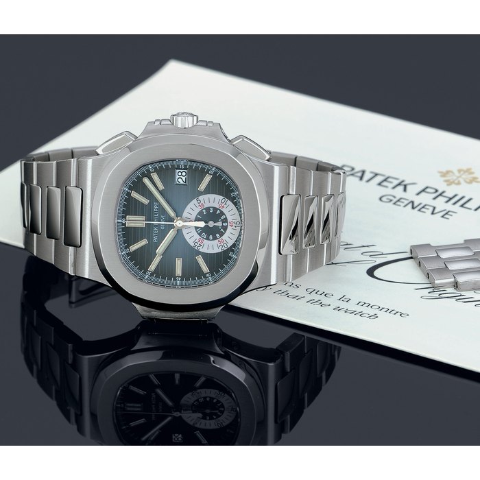 PATEK PHILIPPE. A FINE AND RARE STAINLESS STEEL AUTOMATIC CHRONOGRAPH BRACELET WATCH WITH ORIGINAL CERTIFICATE SIGNED PATEK PHILIPPE, GENEVA, MOVEMENT NO. 3668326, CASE NO. 4383594, REF. 5980/1A, CIRCA 2008