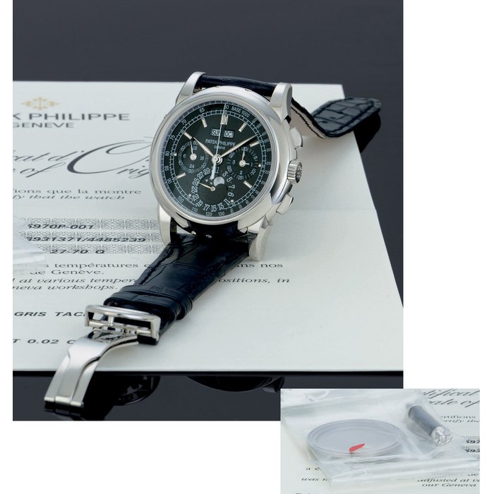 PATEK PHILIPPE. A FINE AND RARE PLATINUM PERPETUAL CALENDAR CHRONOGRAPH WRISTWATCH WITH MOON PHASES, ORIGINAL CERTIFICATE, BOX AND ADDITIONAL PLATINUM CASE BACK SIGNED PATEK PHILIPPE, GENEVE, MOVEMENT NO. 3931371, CASE NO. 4485239, REF. 5970, CIRCA 2009