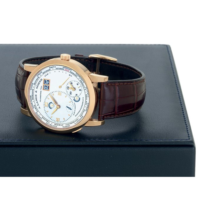 A. LANGE & SÖHNE. AN 18K PINK GOLD DUAL AND WORLD TIME WRISTWATCH WITH DATE AND POWER RESERVE A. LANGE & SÖHNE, GLASHÜTTE I/SA, LANGE 1 TIME ZONE, MOVEMENT NO. 55531, CASE NO. 164258, REF. 116.032, CIRCA 2007
