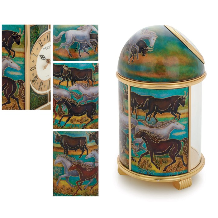 PATEK PHILIPPE. A FINE AND UNIQUE GILT BRASS SOLAR POWERED DESK CLOCK WITH CLOISONNÉ ENAMEL BY L. CHAPPAZ SIGNED PATEK PHILIPPE, GENEVE, DOME MODEL, BOEURS ET CHEVAUX DE CAMARGUE , MOVEMENT NO. 1804483, REF. 1340, MANUFACTURED IN 1988