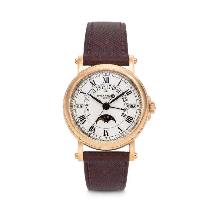 PATEK PHILIPPE. A HEAVY AND IMPRESSIVE 18K PINK GOLD AUTOMATIC OFFICER-CASE PERPETUAL CALENDAR WRISTWATCH WITH RETROGRADE DATE, MOON PHASES, AND LEAP YEAR INDICATION PERPETUAL CALENDAR MODEL, REF. 5059R-001, MOVEMENT NO. 3'235'939, CASE NO. 4'202'000, MANUFACTURED IN 2000