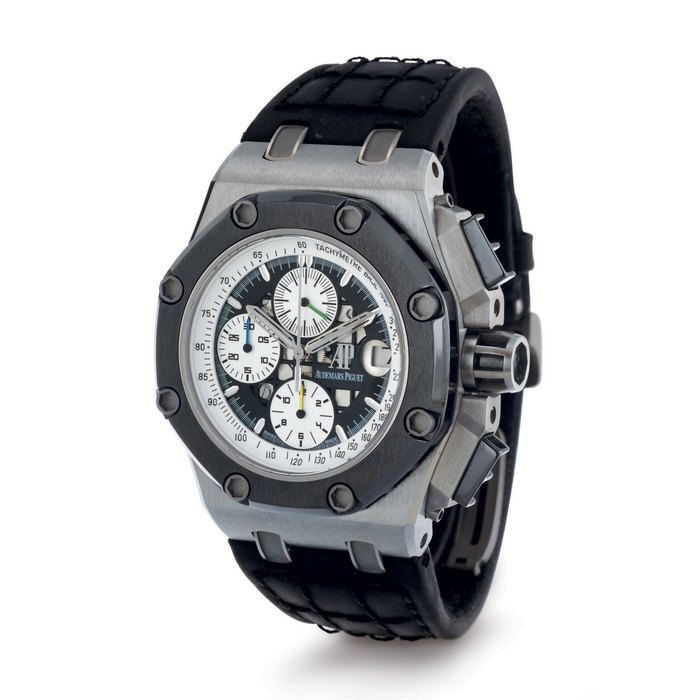 AUDEMARS PIGUET. A LIMITED EDITION TITANIUM AND CERAMIC AUTOMATIC CHRONOGRAPH WRISTWATCH WITH DATE SIGNED AUDEMARS PIGUET, ROYAL OAK, OFFSHORE, LIMITED EDITION, NO. 0582/1000, RUBENS BARRICHELLO, MOVEMENT NO. 643666, CASE NO. F72877, REF. 26078, CIRCA 2009