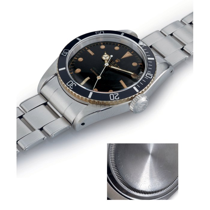 ROLEX. A FINE AND RARE STAINLESS STEEL AUTOMATIC WRISTWATCH WITH CENTER SECONDS AND BRACELET SIGNED ROLEX, OYSTER PERPETUAL, 200M=660FT, SUBMARINER, MOVEMENT NO. 50558, CASE NO. 361913, REF. 5510, CIRCA 1958