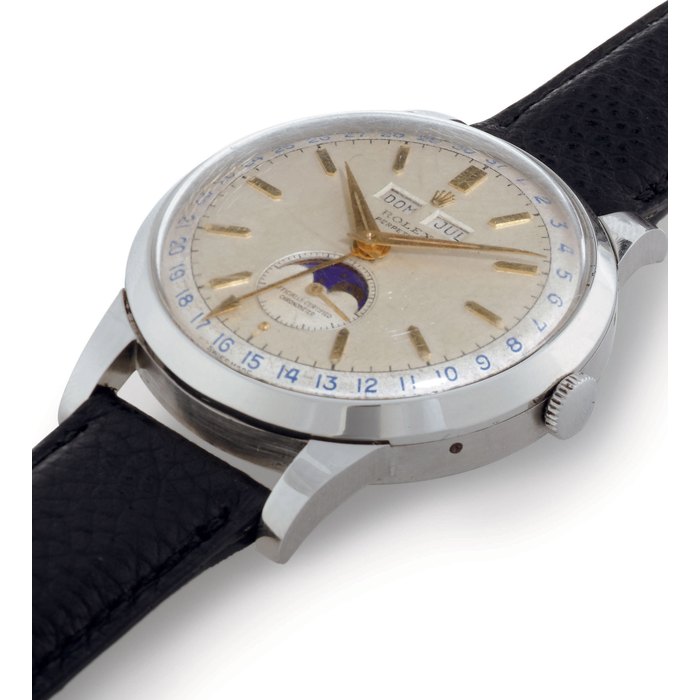 ROLEX. A RARE AND EXTREMELY FINE LARGE STAINLESS STEEL AUTOMATIC TRIPLE CALENDAR WRISTWATCH WITH MOON PHASES SIGNED ROLEX, PERPETUAL, CASE NO. 686144, REF. NO. 8171, CIRCA 1950