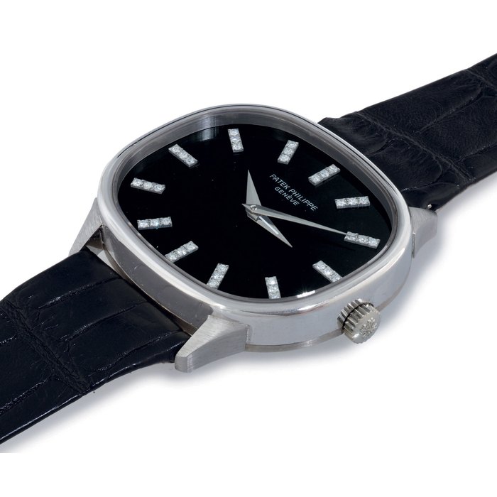 PATEK PHILIPPE. A FINE 18K WHITE GOLD AND DIAMOND CUSHION DUAL TIME WRISTWATCH WITH BLACK DIAL SIGNED PATEK PHILIPPE, GENEVE, MOVEMENT NO. 739749, CASE NO. 2757178, REF. 3619, MANUFACTURED IN 1976