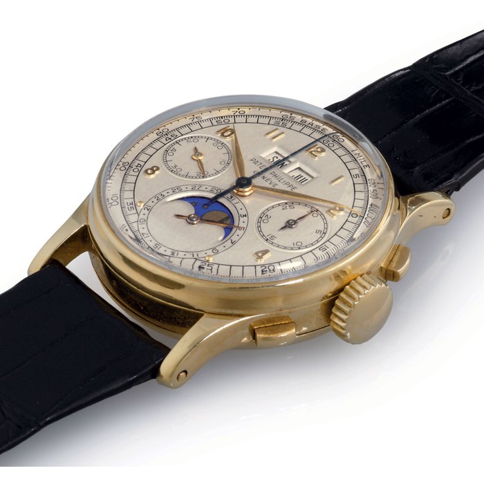 PATEK PHILIPPE. A VERY FINE AND RARE 18K GOLD PERPETUAL CALENDAR CHRONOGRAPH WRISTWATCH WITH MOON PHASES SIGNED PATEK PHILIPPE, GENEVE, REF. 1518 MOVEMENT NO. 867357, CASE NO. 650446, MANUFACTURED IN 1948