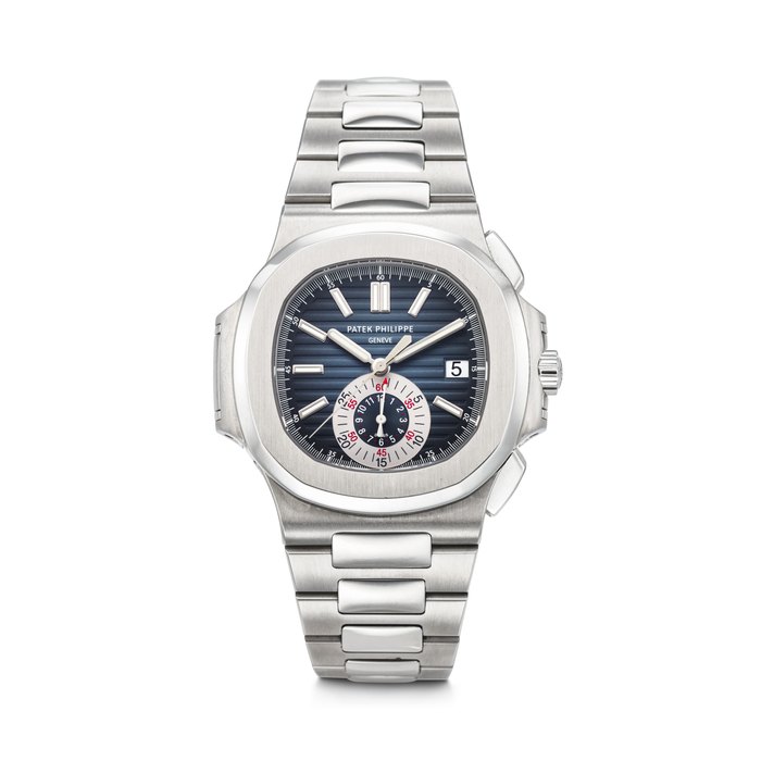 PATEK PHILIPPE. AN ATTRACTIVE STAINLESS STEEL AUTOMATIC FLYBACK CHRONOGRAPH WRISTWATCH WITH DATE AND BRACELET SIGNED PATEK PHILIPPE, NAUTILUS MODEL, REF. 5980/1A-001, MOVEMENT NO. 3'669'982, CASE NO. 4'453'965, CIRCA 2009