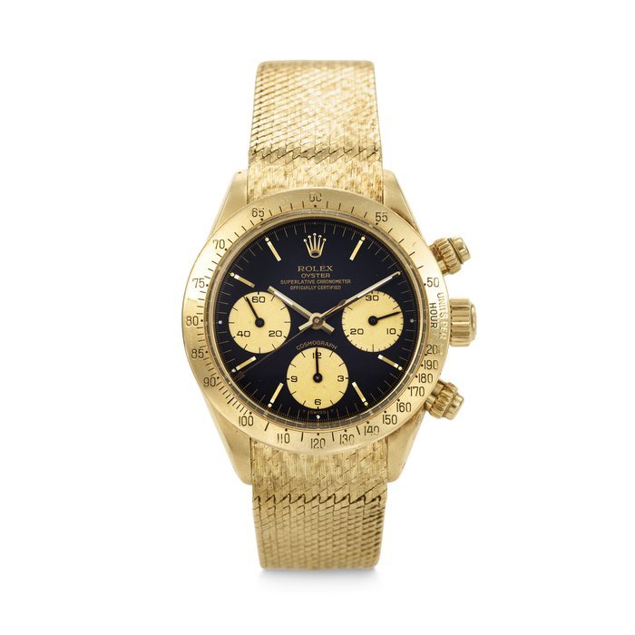 Rolex ROLEX. AN ATTRACTIVE 18K GOLD CHRONOGRAPH WRISTWATCH WITH BRACELET SIGNED ROLEX, DAYTONA MODEL, REF. 6265, CASE NO. 6'123'297, CIRCA 1979 · 6265