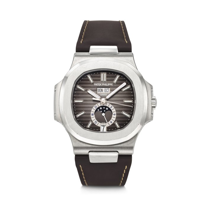 PATEK PHILIPPE. AN ATTRACTIVE STAINLESS STEEL AUTOMATIC ANNUAL CALENDAR WRISTWATCH WITH SWEEP CENTRE SECONDS, MOON PHASES AND 24-HOUR INDICATION SIGNED PATEK PHILIPPE, NAUTILUS MODEL, REF. 5726A-001, MOVEMENT NO. 7'112'919, CASE NO. 6'212'621, CIRCA 2018
