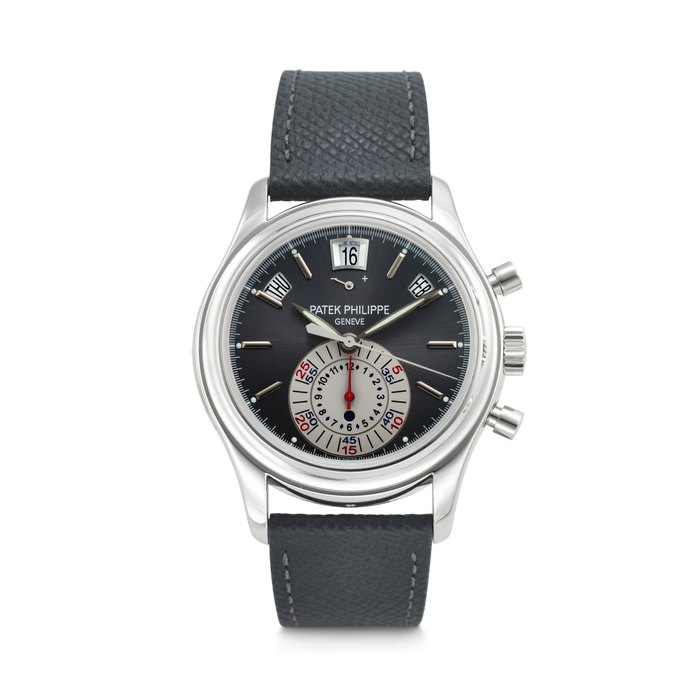 PATEK PHILIPPE. AN ATTRACTIVE PLATINUM AUTOMATIC ANNUAL CALENDAR FLYBACK CHRONOGRAPH WRISTWATCH WITH POWER RESERVE AND DAY/NIGHT INDICATION SIGNED PATEK PHILIPPE, REF. 5960P-001, MOVEMENT NO. 3'501'455, CASE NO. 4'440'376, CIRCA 2008