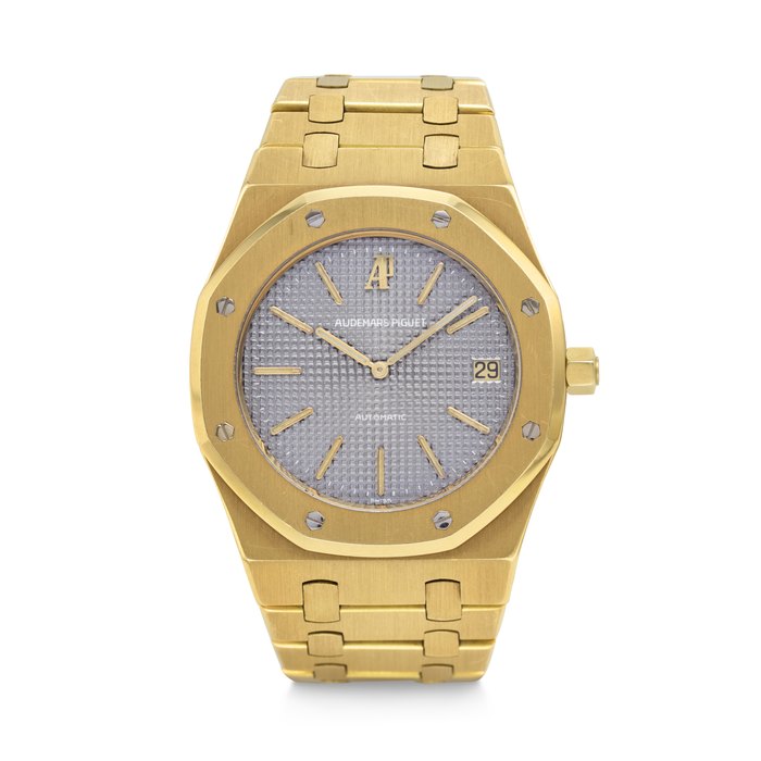 AUDEMARS PIGUET. A VERY RARE AND COVETED 18K GOLD AUTOMATIC WRISTWATCH WITH DATE AND BRACELET ROYAL OAK MODEL, REF. 5402BA, MOVEMENT NO. 211'651, CASE NO. 712, CIRCA 1970s