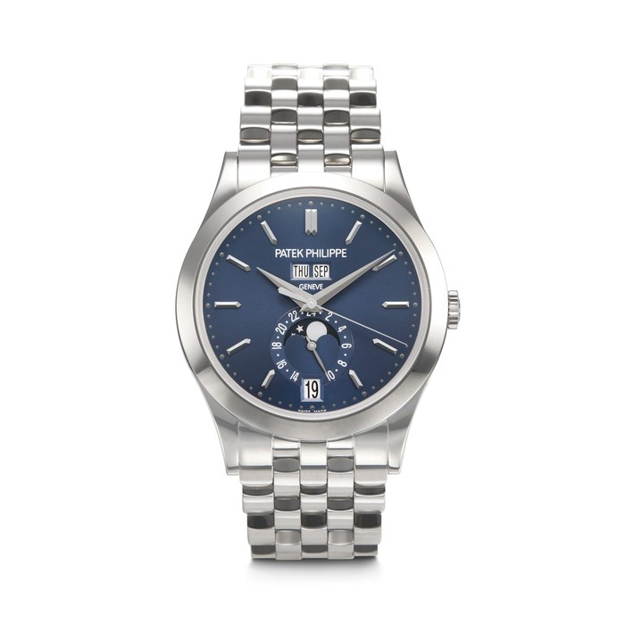 PATEK PHILIPPE. AN ELEGANT 18K WHITE GOLD AUTOMATIC ANNUAL CALENDAR WRISTWATCH WITH SWEEP CENTER SECONDS, MOON PHASES, 24-HOUR INDICATION, AND BRACELET SIGNED PATEK PHILIPPE, REF. 5396/1G-001, MOVEMENT NO. 5'729'825, CASE NO. 4''618'048, CIRCA 2013