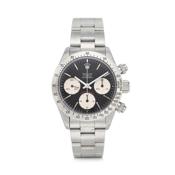 Rolex ROLEX. AN ATTRACTIVE AND SPORTY STAINLESS STEEL CHRONOGRAPH WRISTWATCH WITH BRACELET DAYTONA 'BIG RED' MODEL, REF. 6265, CASE NO. 6'197'376, CIRCA 1979 · 6265