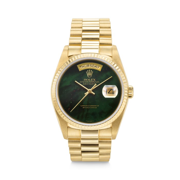 Rolex ROLEX. A HIGHLY ATTRACTIVE AND RARE 18K GOLD AUTOMATIC WRISTWATCH WITH DAY, DATE, BRACELET, AND BLOODSTONE DIAL DAY-DATE MODEL, REF. 18038, CASE NO. 9'486'606, CIRCA 1987, Price & Market Data