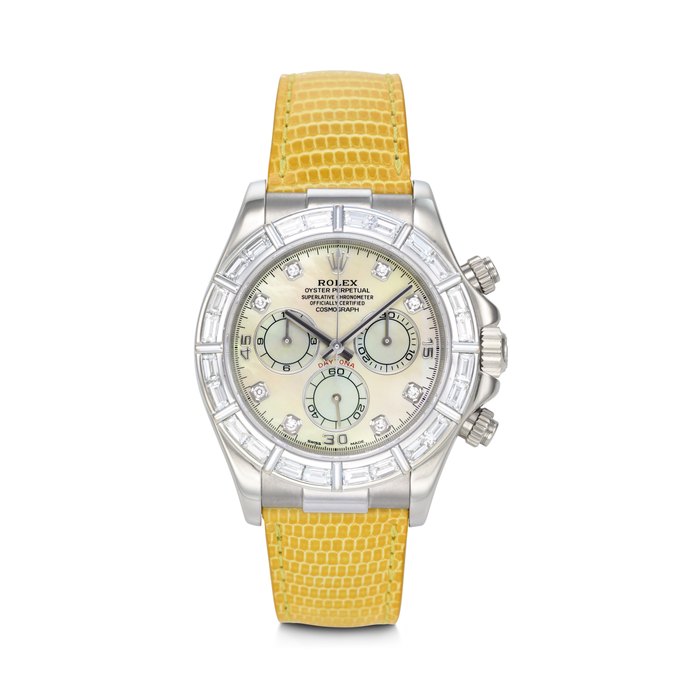 ROLEX. AN EXTREMELY RARE, VIBRANT AND ATTRACTIVE 18K WHITE GOLD AND BAGUETTE DIAMOND-SET AUTOMATIC CHRONOGRAPH WRISTWATCH WITH MOTHER OF PEARL DIAMOND-SET DIAL DAYTONA 'BEACH' MOTHER OF PEARL MODEL, REF. 116589, CASE NO. K553636, CIRCA 2001