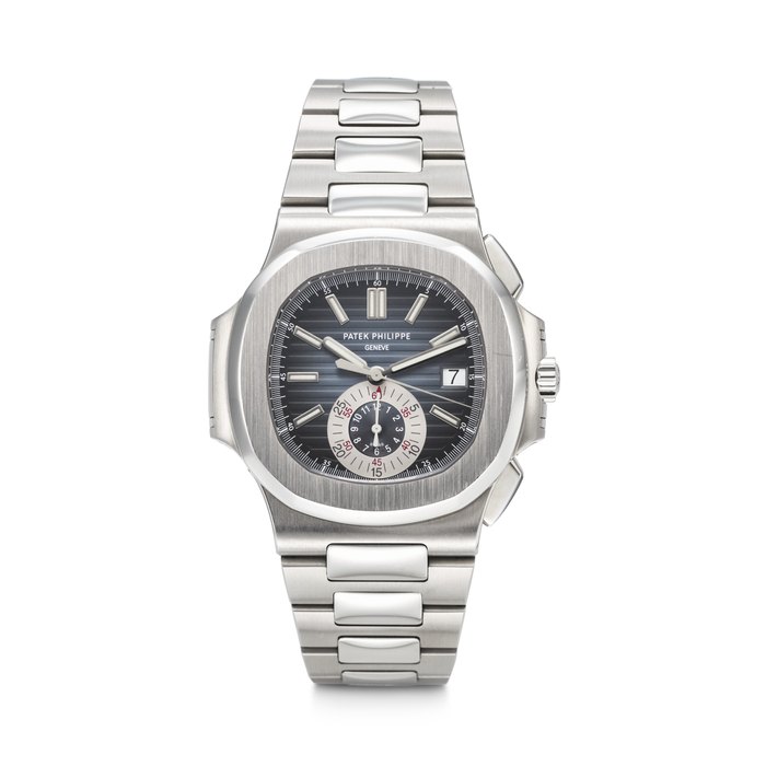 PATEK PHILIPPE. A COVETED AND SPORTY STAINLESS STEEL AUTOMATIC FLYBACK CHRONOGRAPH WRISTWATCH WITH DATE AND BRACELET NAUTILUS MODEL, REF. 5980/1A-001, MOVEMENT NO. 5'595'764, CASE NO. 4'546'810, CIRCA 2013
