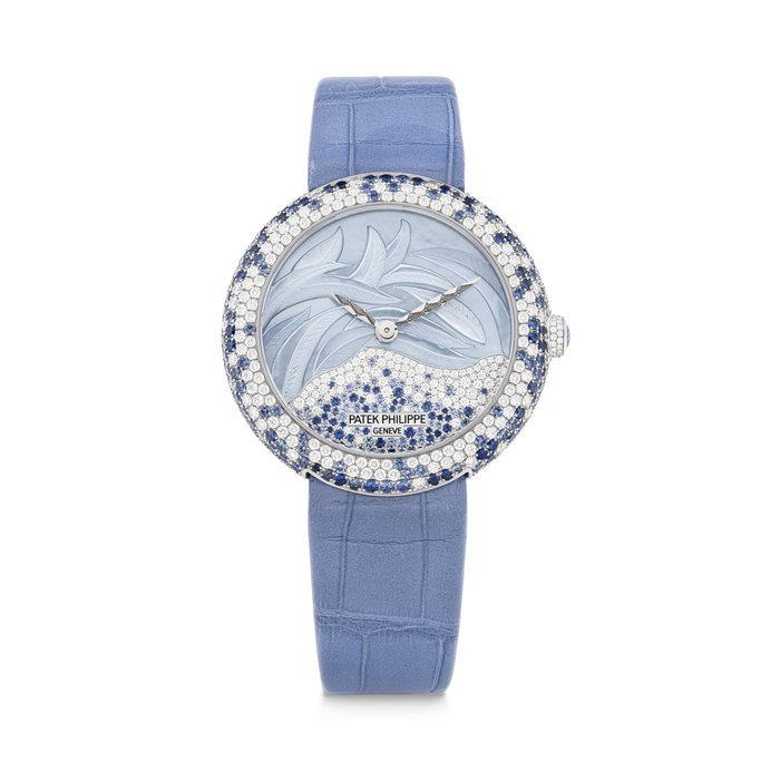 PATEK PHILIPPE. A LADY’S ATTRACTIVE 18K WHITE GOLD, DIAMOND AND SAPPHIRE-SET AUTOMATIC WRISTWATCH WITH HAND-ENGRAVED MOTHER-OF-PEARL DIAL CALATRAVA HAUTE JOAILLERIE MODEL, REF. 4899/901G-001, MOVEMENT NO. 7'242'765, CASE NO. 6'361'897, CIRCA 2019