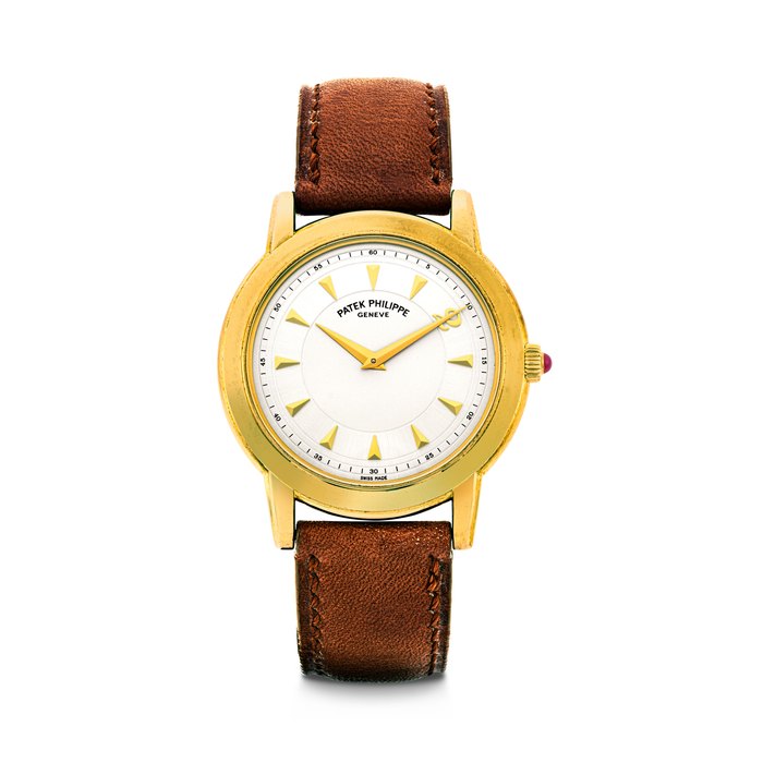 PATEK PHILIPPE. A VERY RARE 18K GOLD LIMITED EDITION AUTOMATIC WRISTWATCH, MADE TO COMMEMORATE THE YEAR 2000 REF. 5032J-012, MOVEMENT NO. 1'202'246, CASE NO. 2'998'199 AND 50⁄100, CIRCA 2000