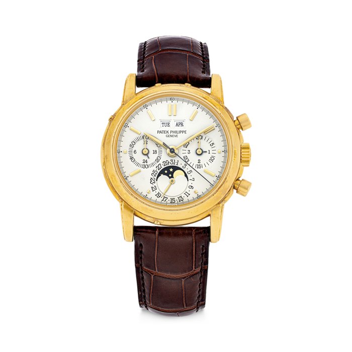 PATEK PHILIPPE. AN EXTREMELY WELL PRESERVED AND RARE 18K GOLD PERPETUAL CALENDAR CHRONOGRAPH WRISTWATCH WITH MOON PHASES, 24 HOUR AND LEAP YEAR INDICATION REF. 3970EJ, "SECOND SERIES", MOVEMENT NO. 875'134, CASE NO. 2'831'378, CIRCA 1988