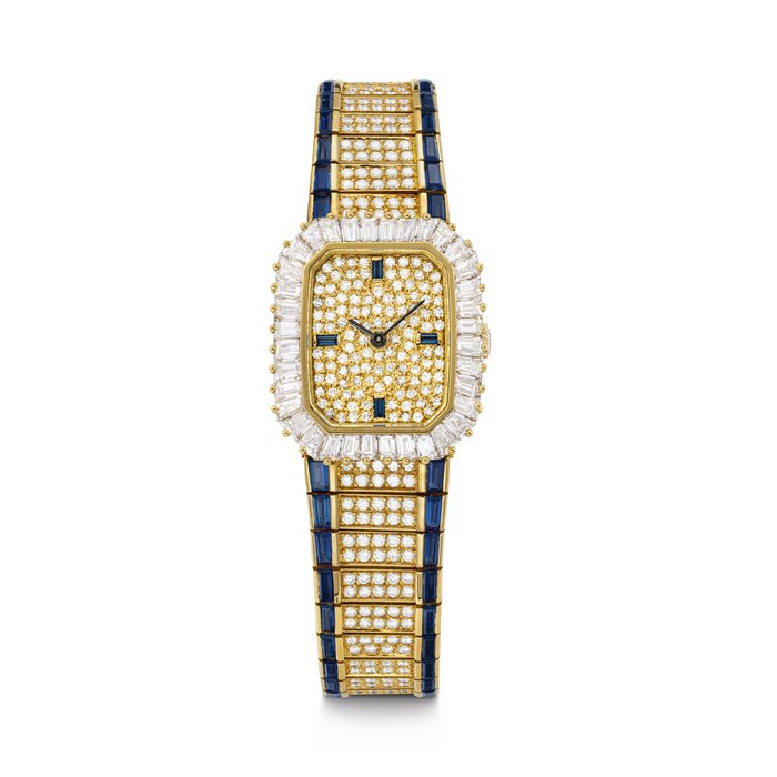 PATEK PHILIPPE. A POSSIBLY UNIQUE AND DAZZLING LADY'S 18K GOLD, DIAMOND AND SAPPHIRE -SET BRACELET WATCH REF. 4044/1J, MOVEMENT NO. 1'410'456, CASE NO. 2'817'778, MANUFACTURED IN 1984