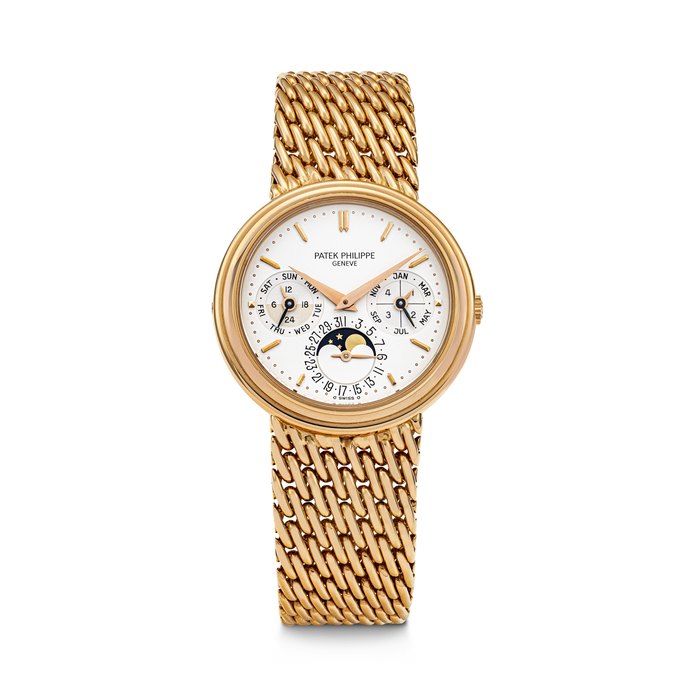 PATEK PHILIPPE. AN 18K PINK GOLD AUTOMATIC PERPETUAL CALENDAR BRACELET WATCH WITH MOON PHASES, LEAP YEAR AND 24 HOUR INDICATIONS REF. 3945/1R, MOVEMENT NO. 772'395, CASE NO. 2‘867’010, CIRCA 1991