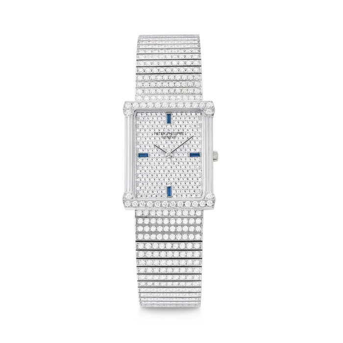 PATEK PHILIPPE. A DAZZLING 18K WHITE GOLD, DIAMOND AND SAPPHIRE-SET BRACELET WATCH LES GRECQUES MODEL, REF. 3977/2G, MOVEMENT NO. 1'650'239, CASE NO. 2'823'387