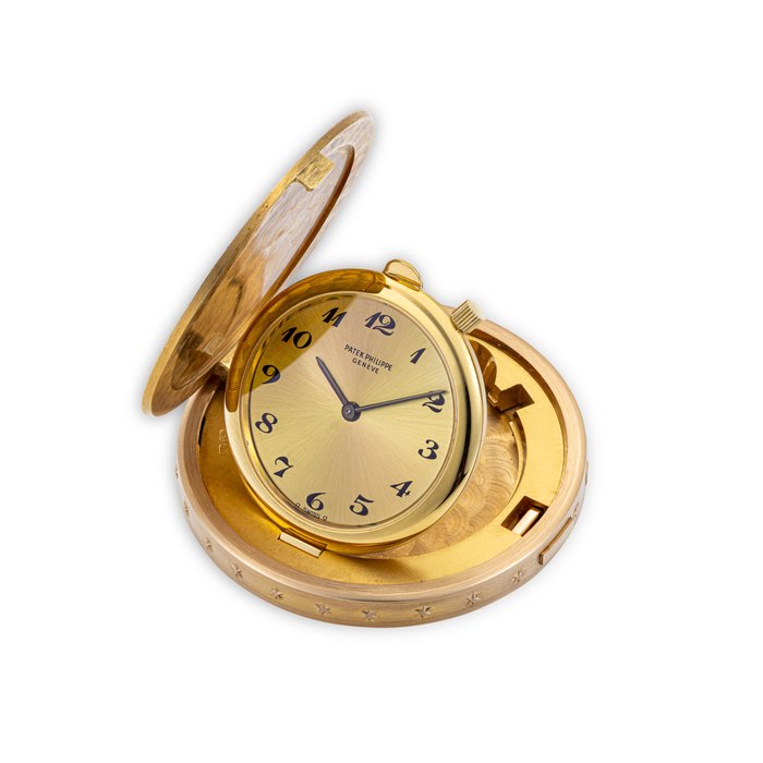 PATEK PHILIPPE. A RARE 18K GOLD UNITED STATES OF AMERICA TWENTY DOLLAR COIN WATCH WITH BREGUET NUMERALS REF. 802, MOVEMENT NO. 1'389'993, CASE NO. 2'896'362, CIRCA 1993